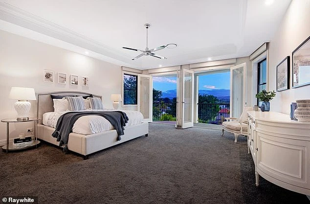 Interior: The stunning master bedroom offers picturesque views