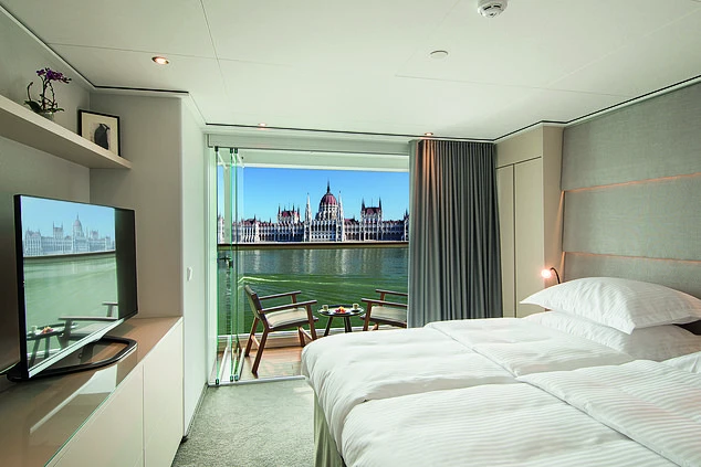 An elegant suite with large balcony on the Emerald Cruises Star-Ship