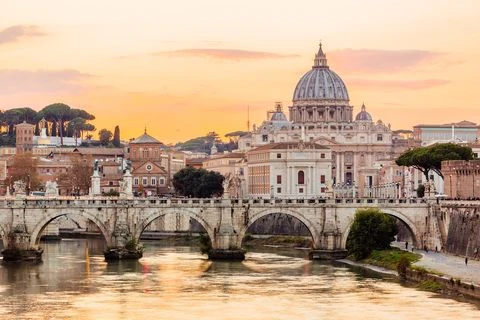 view of the city of rome with the tiber and st peters
