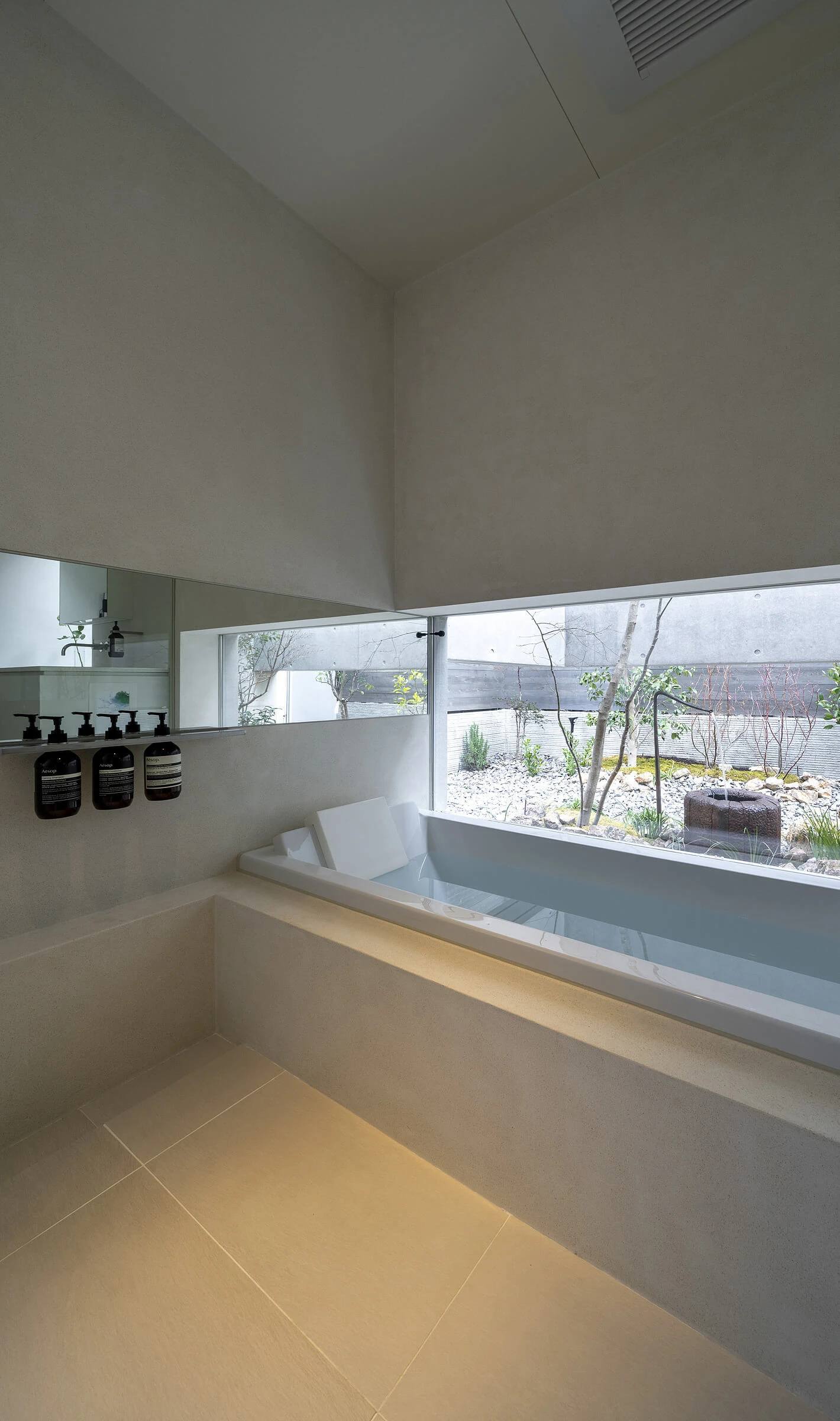 The bathroom overlooks an intimate rock garden |  Sculpt |  Japan |  STIRworld