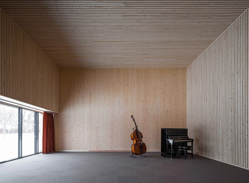 wood and neat interior characterize this school of culture in norway