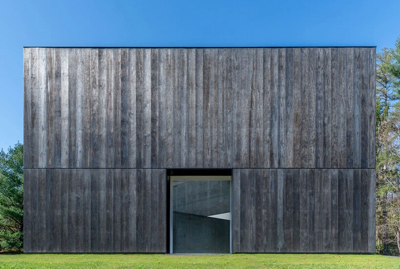 OLI Architecture places Richard Serra's London Cross sculpture in charred wooden pavilion in New York City